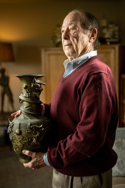 Art Conger acquired his Ming Dynasty Chinese vase (from the Xuandi Emperor’s reign, 1426-1435) by bidding on the contents of the home where he had rented a room from two old women in San Francisco years ago. It wasn’t until he had it authenticated that he understood the true historic value of the bronze five-fingered dragon vase.  (COLIN MULVANY/THE SPOKESMAN-REVIEW)