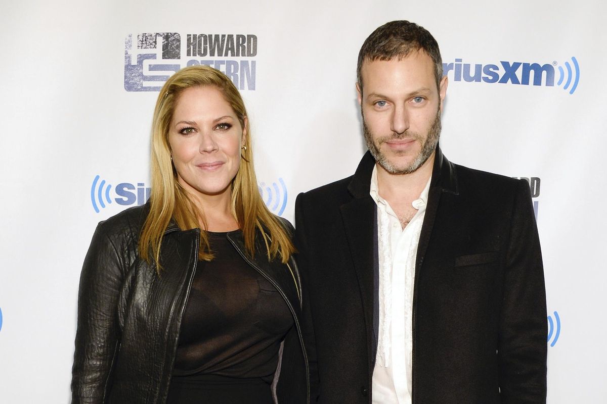 In this Jan. 31, 2014 photo, actress Mary McCormack, left, and husband Michael Morris attend “Howard Stern