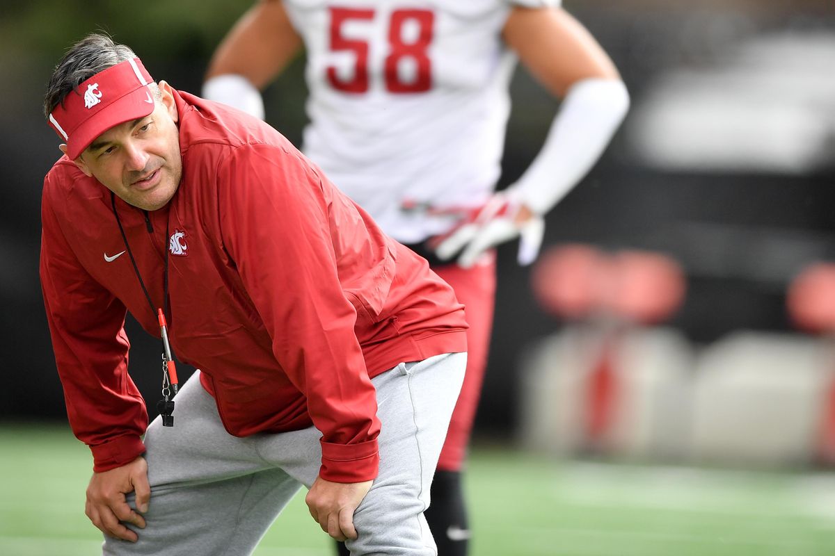 WSU linebackers coach Roc Bellantoni coaches up his players during a spring practice on Thursday, April 4, 2019, at Martin Stadium in Pullman, Wash. (Tyler Tjomsland / The Spokesman-Review)