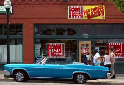 
The Spokesman-Review A classic Chevrolet Impala is parked outside The Pop Shoppe, a new business in the Perry district near the intersection of East 10th Avenue and South Perry Street.
 (INGRID BARRENTINE / The Spokesman-Review)