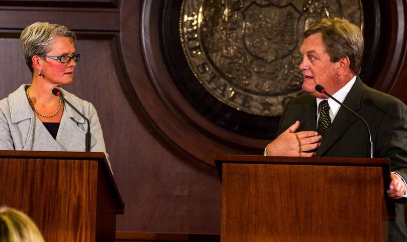 Idaho GOP Congressman Mike Simpson, right, debates his Democratic challenger, state Sen. Nicole LeFavour, left, Sunday night in the 