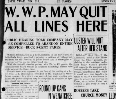 The rise in popularity of the jitneys and an increase in fares led Washington Water Power Co. to threaten to end its streetcar service in Spokane.  (S-R archives)