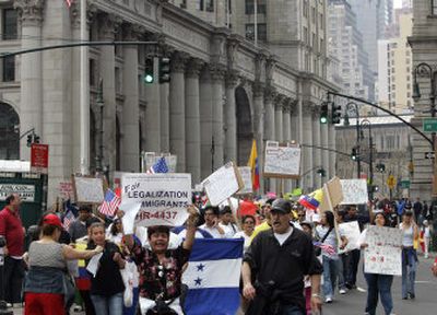 
Immigrant rights supporters, many of them Latin American, finish a protest march that began Saturday in Brooklyn and ended in lower Manhattan.
 (Associated Press / The Spokesman-Review)