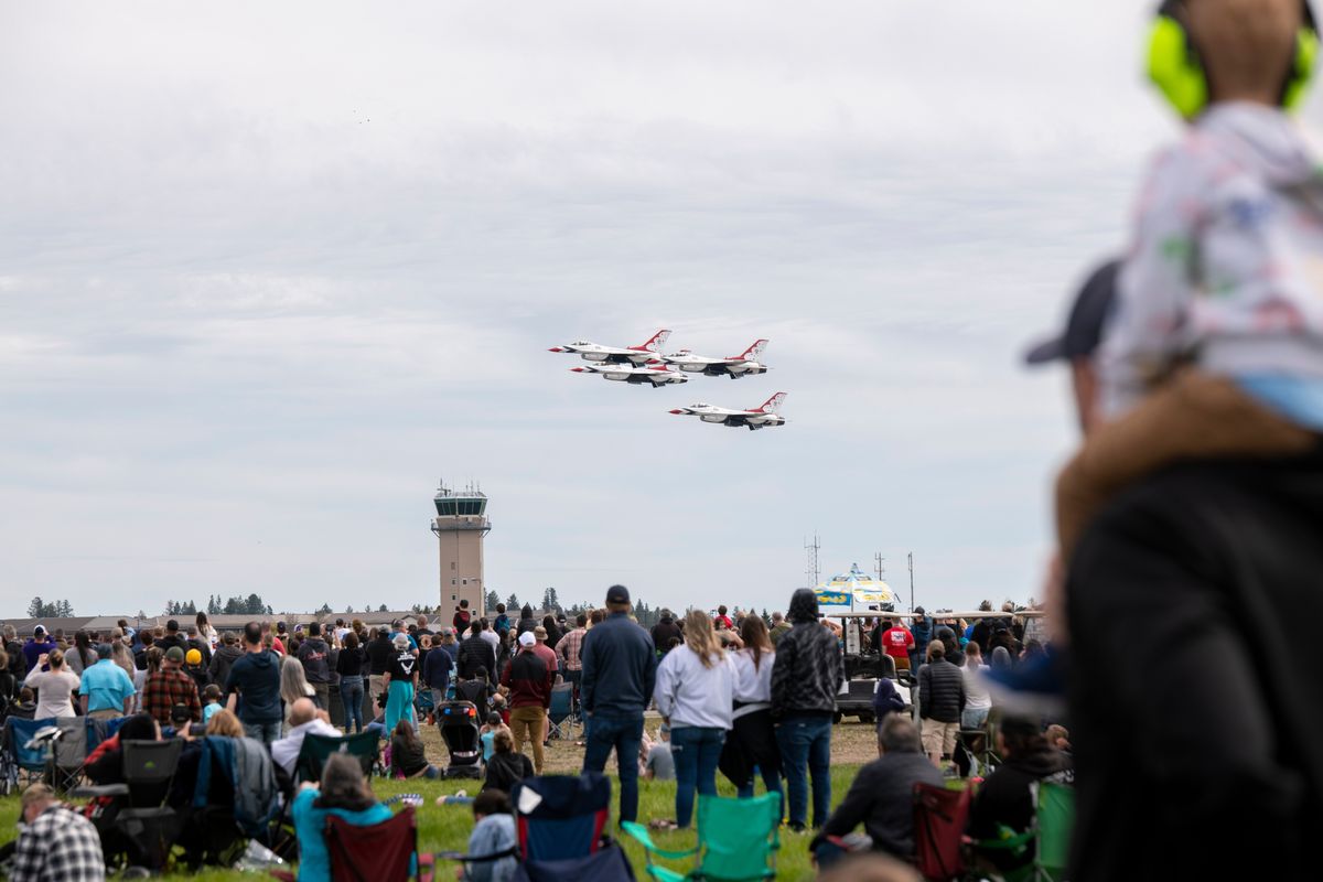 Four of the six Thunderbird aircraft make a low pass over the flight line at Fairchild Air Force Base on Sunday, the last day of SkyFest.  (Jesse Tinsley/THE SPOKESMAN-REVI)