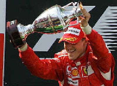
Michael Schumacher celebrates. 
 (Associated Press / The Spokesman-Review)