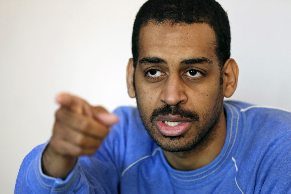 In this Friday, March 30, 2018 photo, Alexanda Amon Kotey, allegedly among four British jihadis who made up a brutal Islamic State cell dubbed "The Beatles," speaks during an interview with The Associated Press at a security center in Kobani, Syria. Kotey, a British national admitted Thursday evening, Sept. 2, 2021 in a federal courtroom near the nation