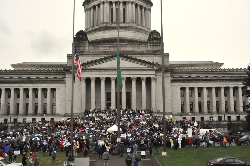 Abortion protesters gather on the north steps of the state Capitol on Jan. 18, 2011. (Jim Camden/The Spokesman-Review)