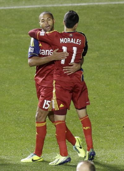 Alvaro Saborio’s goal earns hug from RSL teammate Javier Morales, right. (Associated Press)