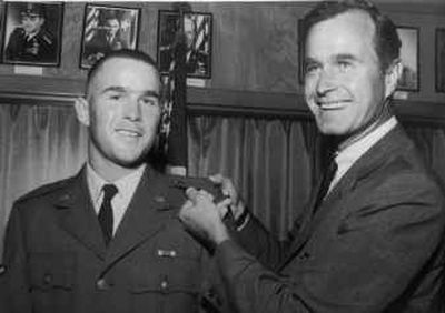 
 George W. Bush and his father, George H. W. Bush, are seen at Ellington Field, Texas, in 1968. The White House said Wednesday that Bush never asked his father or family friends to get him into the Guard during the Vietnam War.
 (File/Associated Press / The Spokesman-Review)