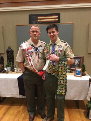 Jourdan Hale, right, receives his final three merit badges and his Order of the Arrow vigil feather recently with Ron Shake, eagle chair for the Boy Scouts of America's Columbia Gorge district. (Courtesy)