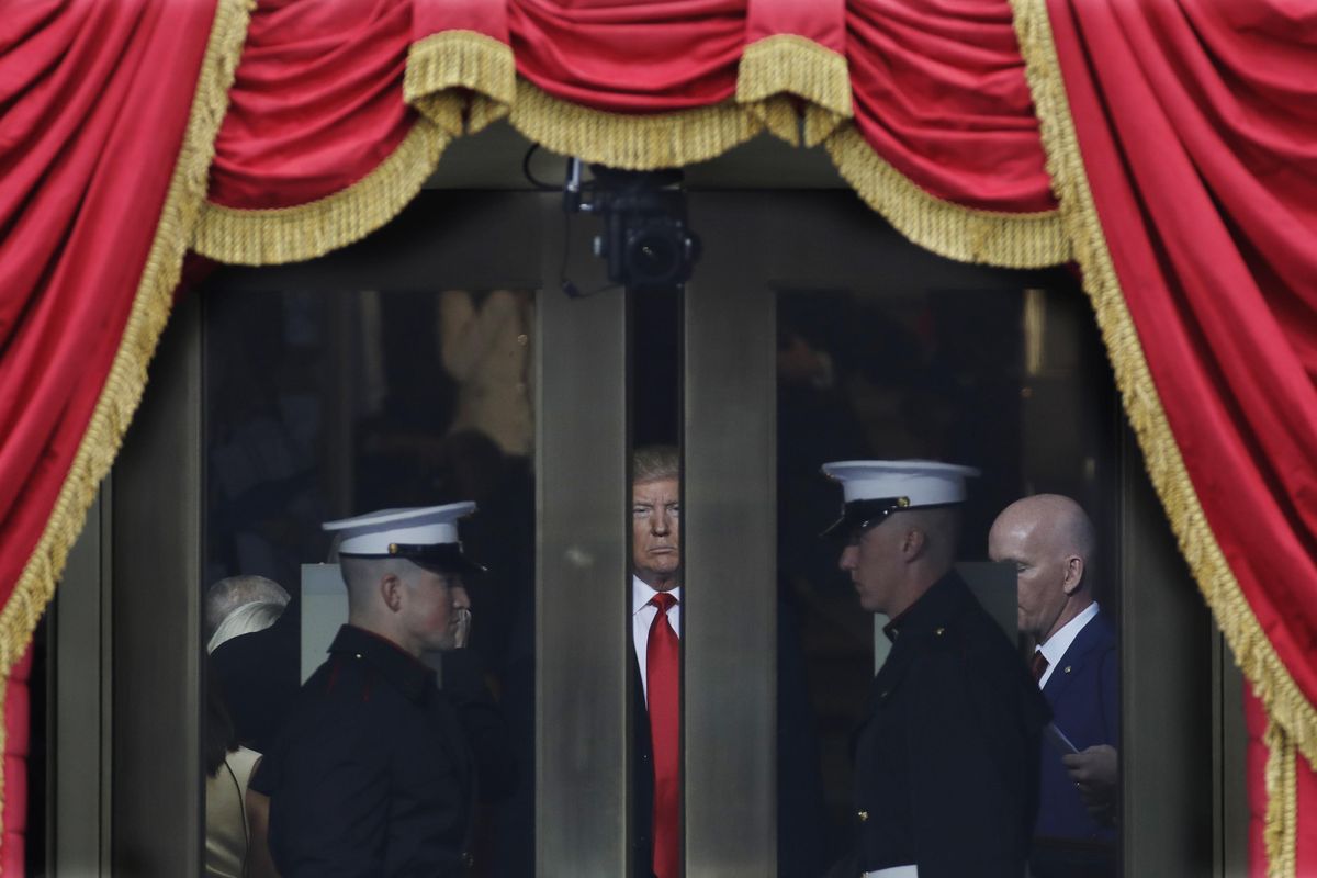 President-elect Donald Trump waits to stop out onto the portico for his Presidential Inauguration at the U.S. Capitol in Washington, Friday, Jan. 20, 2017. (Patrick Semansky / Associated Press)