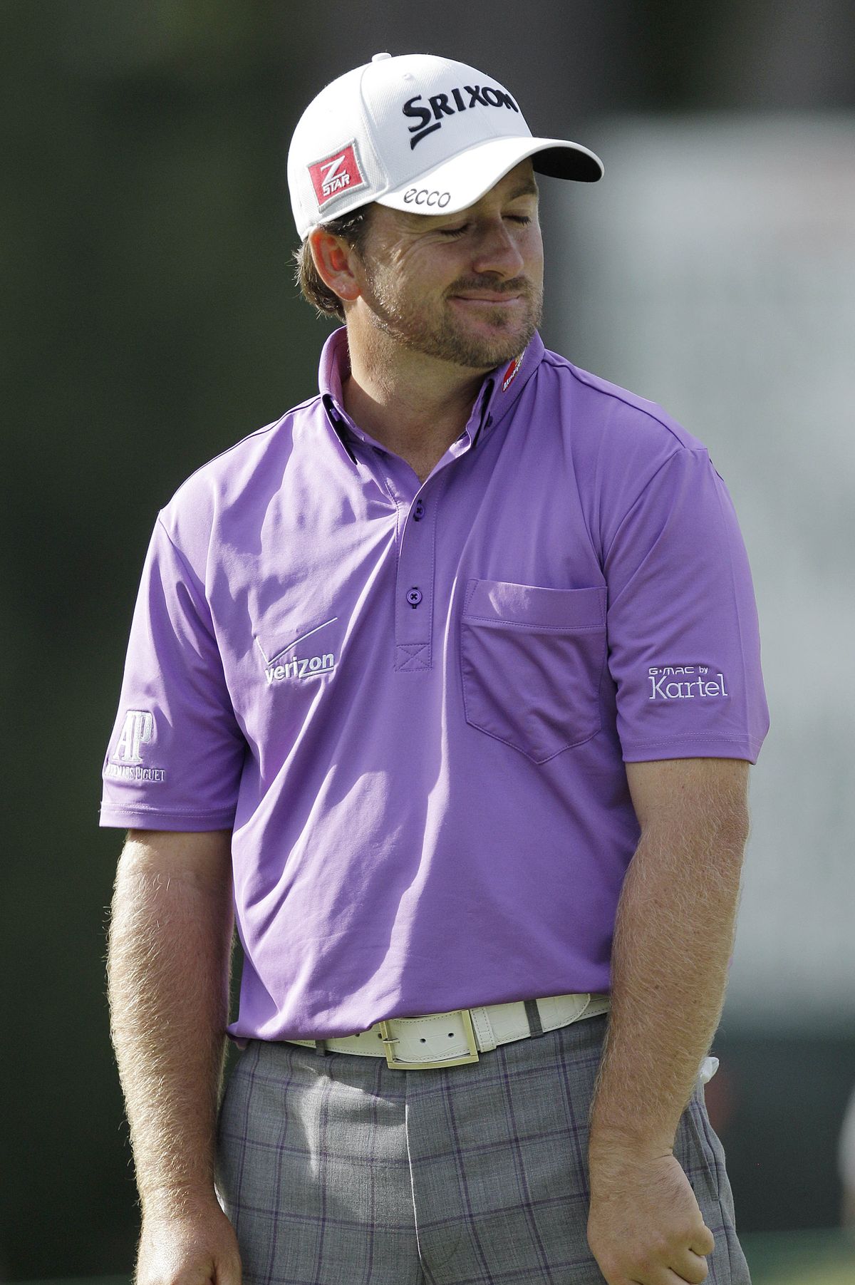 Third-round co-leader Graeme McDowell, the 2010 U.S. Open champion, grimaces after missing a putt on the 14th hole Saturday in San Francisco. (Associated Press)