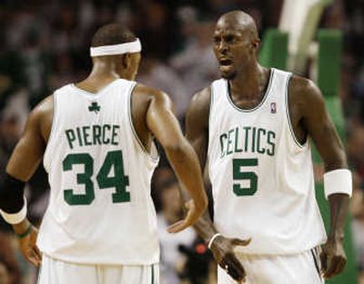 
Forward Kevin Garnett, right, came up big in his Celtics debut with 22 points, 20 rebounds and five assists. Associated Press
 (Associated Press / The Spokesman-Review)