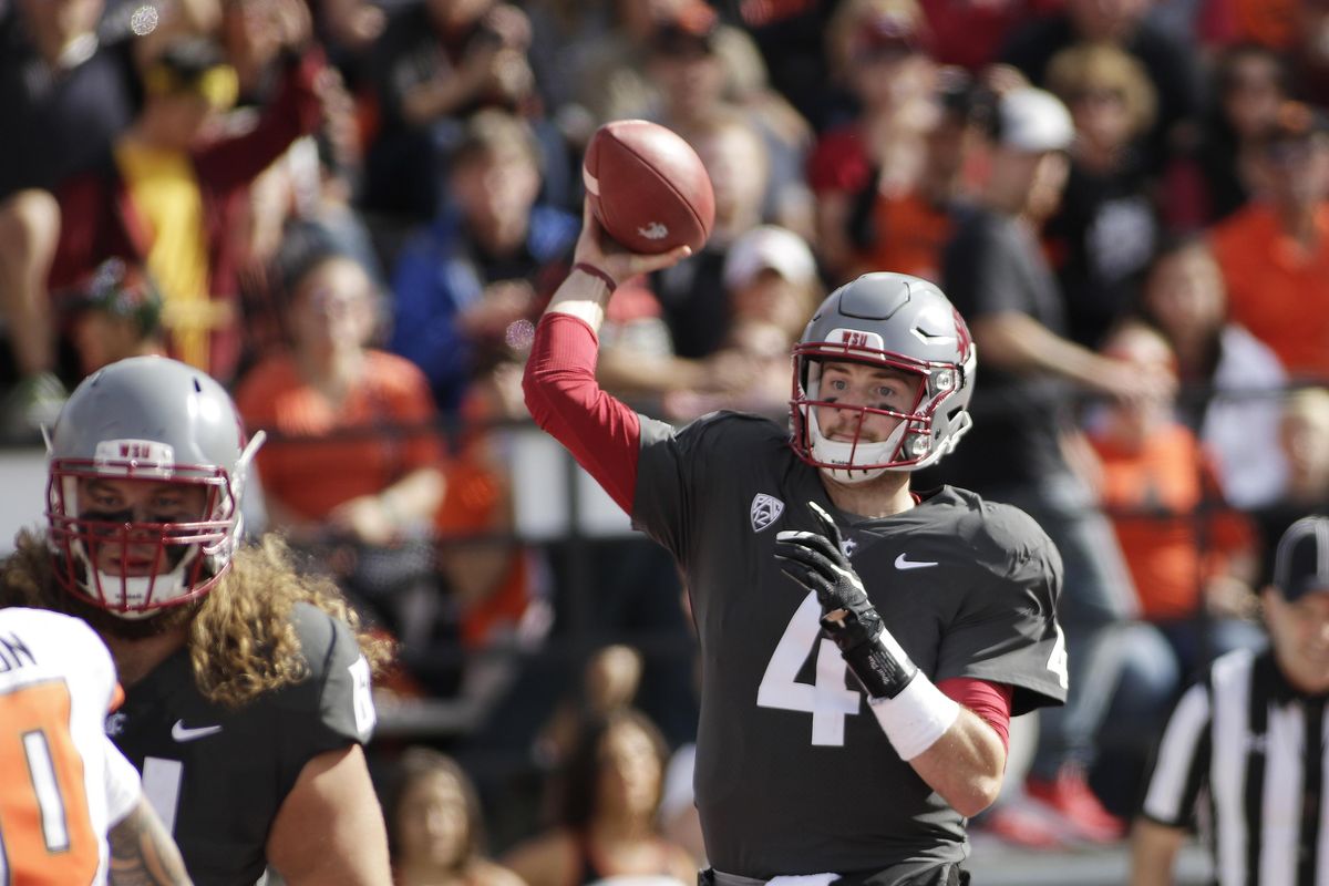 Washington State quarterback Luke Falk (4) throws a pass during the first half of an NCAA college football game against Oregon State in Pullman, Wash., Saturday, Sept. 16, 2017. (AP Photo/Young Kwak) ORG XMIT: WAYK110 (Young Kwak / AP)