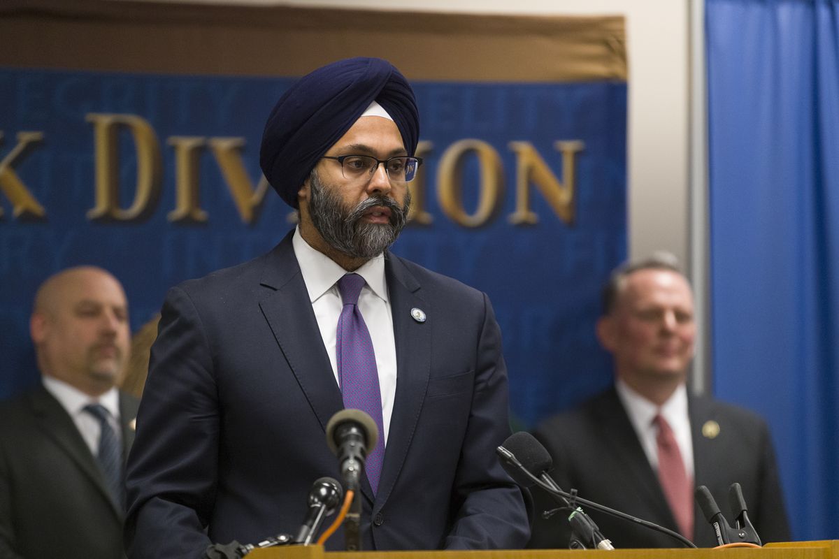 FILE - In this Jan. 13, 2020 file photo, New Jersey Attorney General Gurbir Grewal makes a statement at a new conference to provide an update on the Dec. 10 Jersey City shootings at the FBI headquarters in Newark, N.J. Cases involving police use of force often include questions about the internal records of the officers involved, records that in most cases are off-limits to the press and public. Lawmakers in at least 13 states have considered bills this year to make those records more publicly available.  (Steve Hockstein)