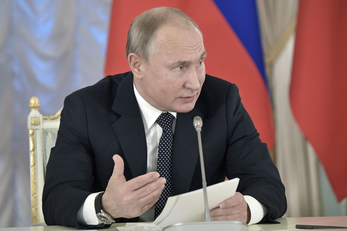 Russian President Vladimir Putin speaks at meeting with cultural advisers in St. Petersburg, Russia, on Saturday, Dec. 15, 2018. Alarmed by the growing popularity of rap among Russian youth, President Vladimir Putin wants cultural leaders to devise a means of controlling, rather than banning, popular music. (Alexei Nikolsky / AP)