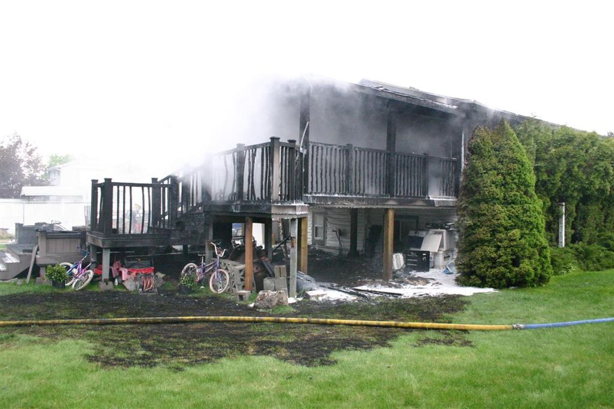 A home at Wellesley and Moore in Spokane Valley was damaged by fire the morning of May 16, 2011. (Photo courtesy Spokane Valley Fire Department)