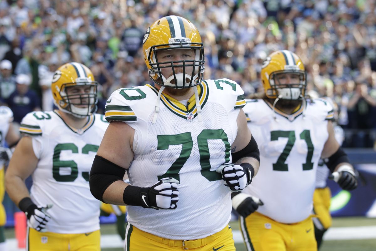 Center Corey Linsley, guard T.J. Lang and guard Josh Sitton, left to right, protect the line for the Green Bay Packers. (Associated Press)