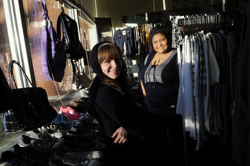 West Valley junior Jacque Swanson, left, and senior Linda Juitt have helped open Inspire, a clothing store for lower-income and budget-minded students. As a part of their Family, Career and Community Leaders of America program, they’ve opened the in-school store two days a week. (J. Bart Rayniak)