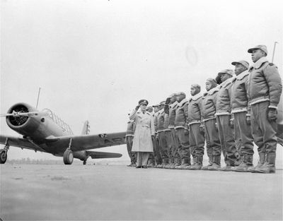 Major James A. Ellison, left, returns the salute of Mac Ross of Dayton, Ohio, as he inspects the cadets at the Basic and Advanced Flying School for Negro Air Corps Cadets in this Jan. 23, 1942 file photo at the Tuskegee Institute in Tuskegee, Ala. Sixty-two years ago, John Allen, Robert Lawrence and James Williams were fighting two battles: one against Nazi Germany, another against racism in the military. (AP)