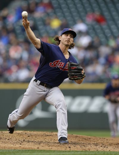 Cleveland Indians pitcher Josh Tomlin threw a one-hitter for his first career shutout in his 64th start. (Associated Press)
