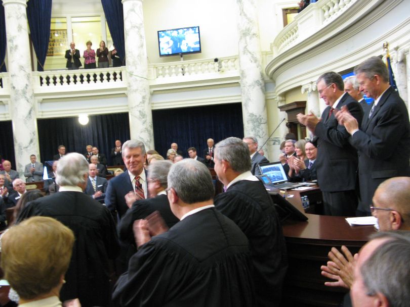 Gov. Butch Otter is applauded by lawmakers and state officials at the close of his State of the State message (Betsy Russell)