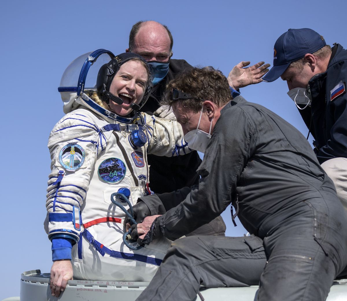 Expedition 64 NASA astronaut Kate Rubins is helped out of the Soyuz MS-17 spacecraft after it landed Saturday in a remote area near the town of Zhezkazgan, Kazakhstan.  (Bill Ingalls)