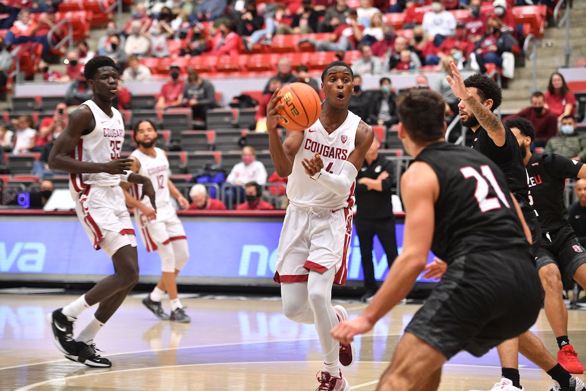 Washington State guard looks to make a pass during a nonconference game against Seattle U on Friday at Beasley Coliseum in Pullman.  (Dean Hare/WSU)