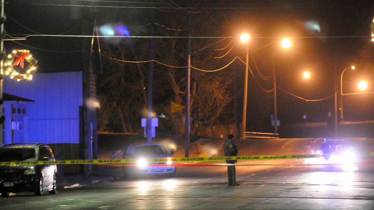 Crime scene tape crosses Main Street between Third Avenue South and Fifth Avenue South early Friday, Nov. 30, 2012, in Cold Spring, Minn., after a Cold Spring police officer was fatally shot while conducting a routine check near a bar. (Eric Stromgren / The St. Cloud Times)