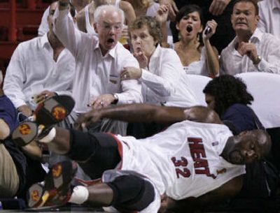 
A flagrant foul by Dallas' Jerry Stackhouse on Miami's Shaquille O'Neal drew a reaction from fans and the NBA. 
 (Associated Press / The Spokesman-Review)