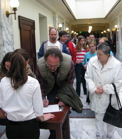 Hundreds line up to sign up to testify against proposed Medicaid cuts at the Idaho Legislature on Tuesday. (Betsy Russell)