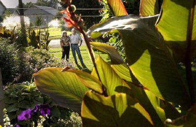 
Lorae and Jeff Sims in their North Side yard.
 (The Spokesman-Review)