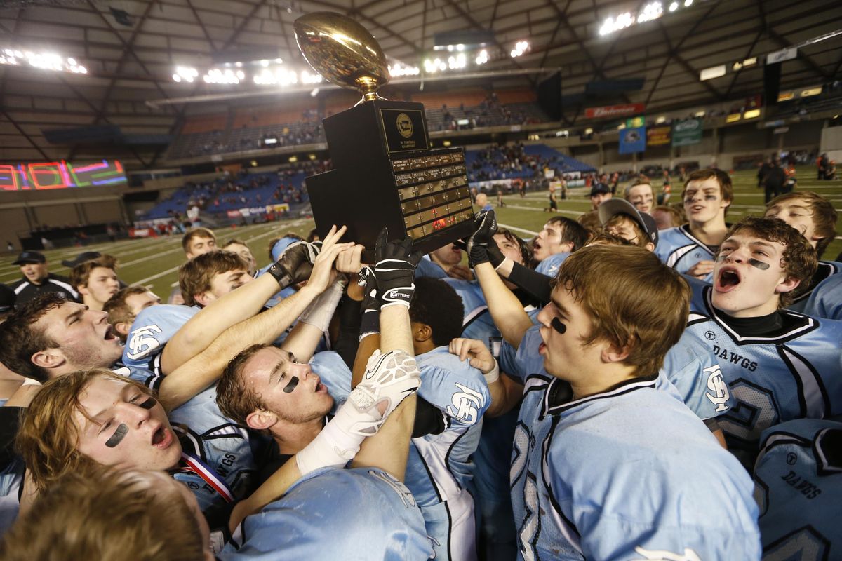 The Freeman Scotties celebrate a State 1A championship game win over Mount Baker on Saturday. (Associated Press)