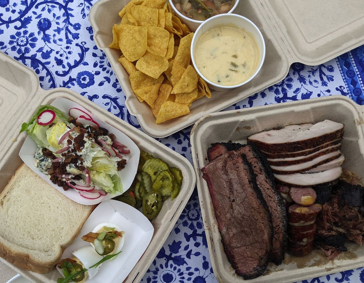 Grasslands Barbecue serves massive platters of Texas-style barbecued meats, deviled eggs, queso and more at events in the Gorge area.  (Jackie Varriano/Seattle Times)
