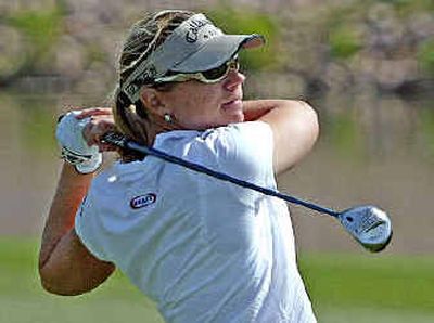 
Annika Sorenstam hits a fairway wood on the 18th hole during the first round of the Safeway International.
 (Associated Press / The Spokesman-Review)