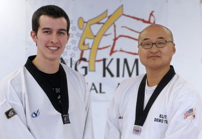 Jung Kim, right, shown with his head instructor, Justin Howard, has opened a martial arts studio that teaches tae kwon do. (J. BART RAYNIAK / The Spokesman-Review)