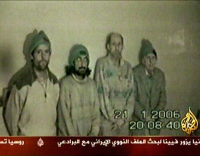 
Kidnapped peace activists James Loney, left, Harmeet Singh Sooden, Tom Fox and Norman Kember are seen in this image aired by Al-Jazeera TV on Saturday. 
 (Associated Press / The Spokesman-Review)