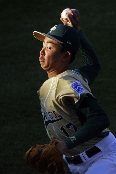 South Korea pitcher Junho Jeong delivers a pitch during the third inning of a game against Curacao at the Little League World Series. (Gene J. Puskar / Associated Press)