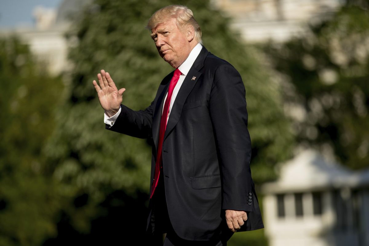 President Donald Trump walks across the South Lawn as he arrives at the White House in Washington, Friday, April 28, 2017, returning from traveling to Atlanta to speak at the National Rifle Association Leadership Forum. (Andrew Harnik / Associated Press)