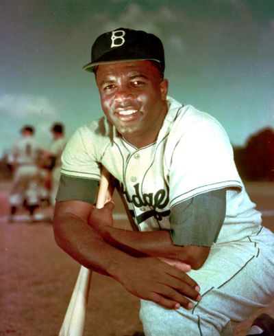 Brooklyn Dodgers infielder Jackie Robinson, the first Black player in Major League Baseball, poses for a photograph in 1952. The location is unknown.  (Courtesy)