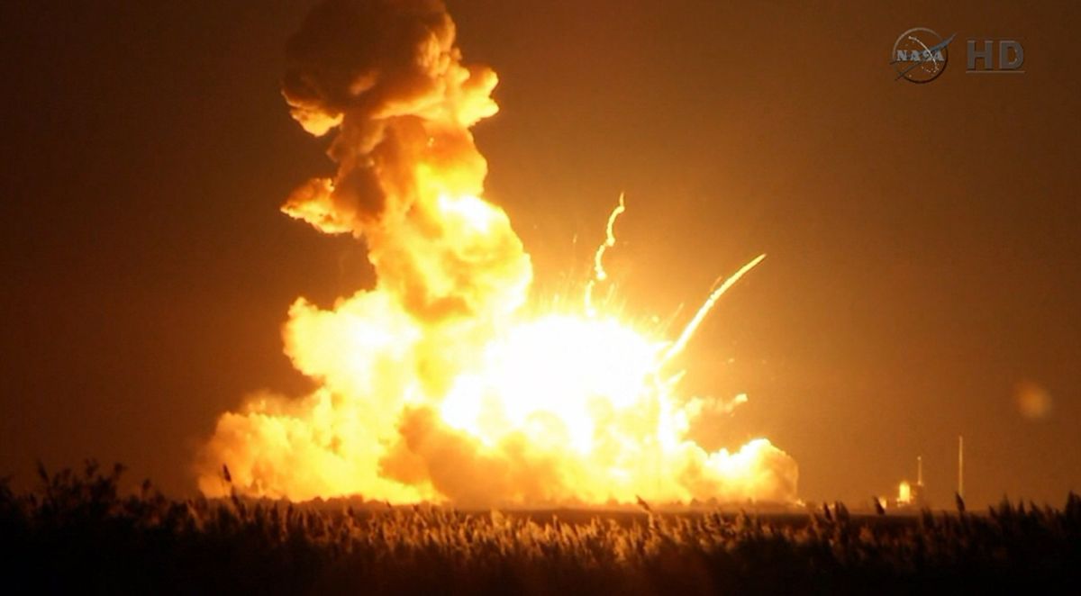 This image taken from NASA video shows Orbital Sciences Corp.’s rocket blowing up after liftoff at Wallops Island, Va. (Associated Press)