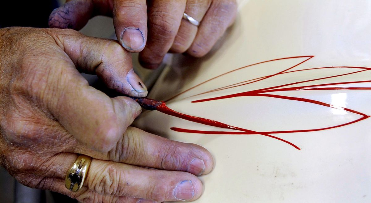 “There’s not a lot of brush guys around,” Audel says while showing his pinstriping technique.