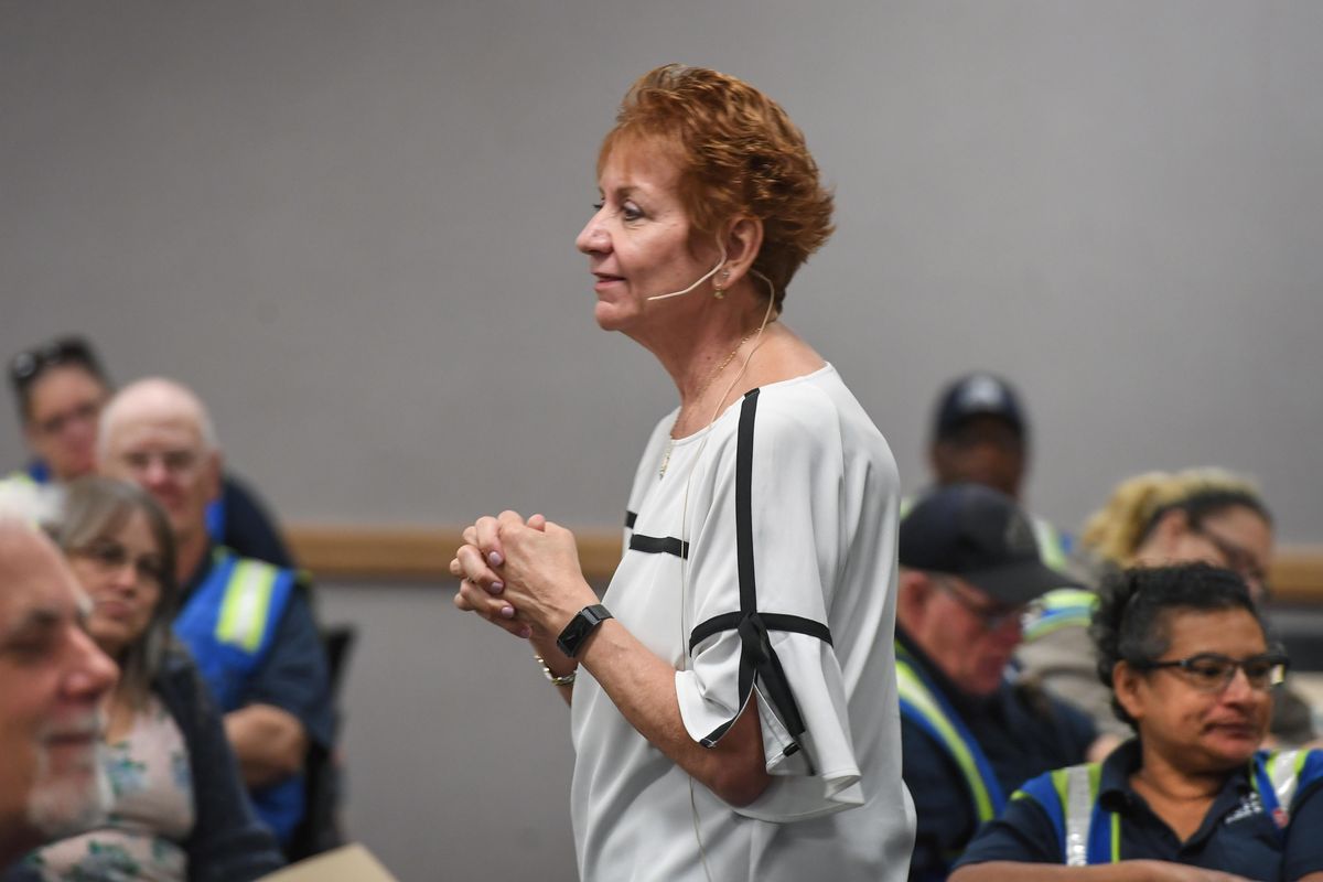 Mary Leonard, Senior Vice President and Chief Operation Officer/Special Education for National Express, talks with a group of 150 school bus drivers Tuesday during training class for all Durham School Services drivers in de-escalation tactics at Spokane Community College. (Dan Pelle / The Spokesman-Review)