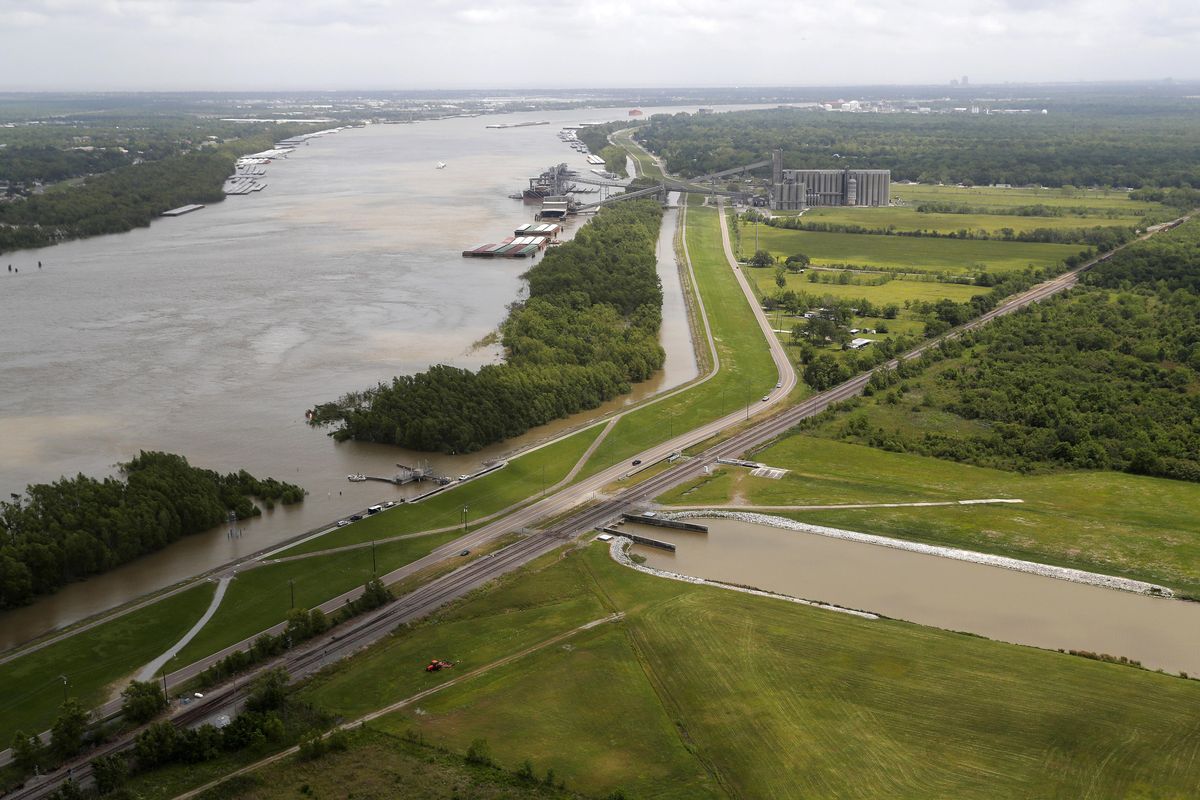 The Davis Pond Diversion is a project that diverts water from the Mississippi River, left, into the Barataria Basin to reduce coastal erosion in St. Charles Parish, La. (Gerald Herbert / Associated Press)