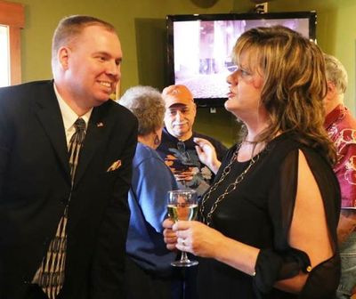 Digger and Cindy talk in the foreground while DFO huddles with a couple in the background at Blogfest 2016. (Don Sausser/Special to Huckleberries Online)
