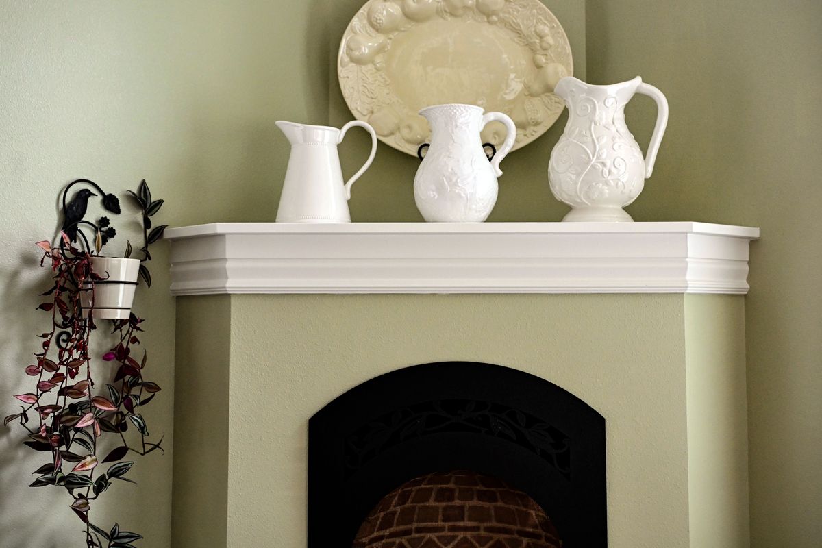 Cherylee Duncan’s collection of “lumpy whites” is scattered throughout her South Hill home, including the family room mantel. Her current items are actually her second collection of lumpy whites. In 2005, most of her pieces were casualties of a magnitude 6.5 earthquake in Atascadero, California.  (COLIN MULVANY/THE SPOKESMAN-REVIEW)
