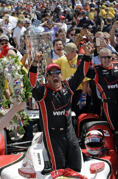 Juan Pablo Montoya of Colombia soaks in his second Indianapolis 500 victory. His first came 15 years ago. (Associated Press)