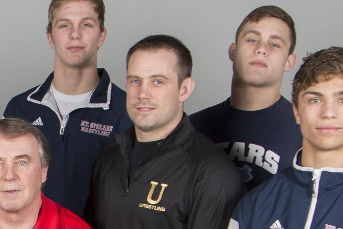 University wrestling coach Ryan Montang, center. (Jesse Tinsley / The Spokesman-Review)