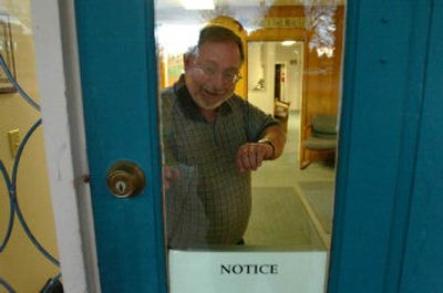 
Kootenai County Clerk Dan English  locks the door of the elections office Friday at 5 p.m. to signal the end of the filing period for elected office in Kootenai County. English is the lone elected Democrat in the county. 
 (Jesse Tinsley / The Spokesman-Review)