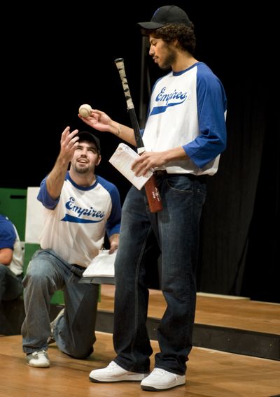 GU basketball player Steven Gray, right, and Jacob Moore perform a scene from the play “Take Me Out.” (Colin Mulvany / The Spokesman-Review)